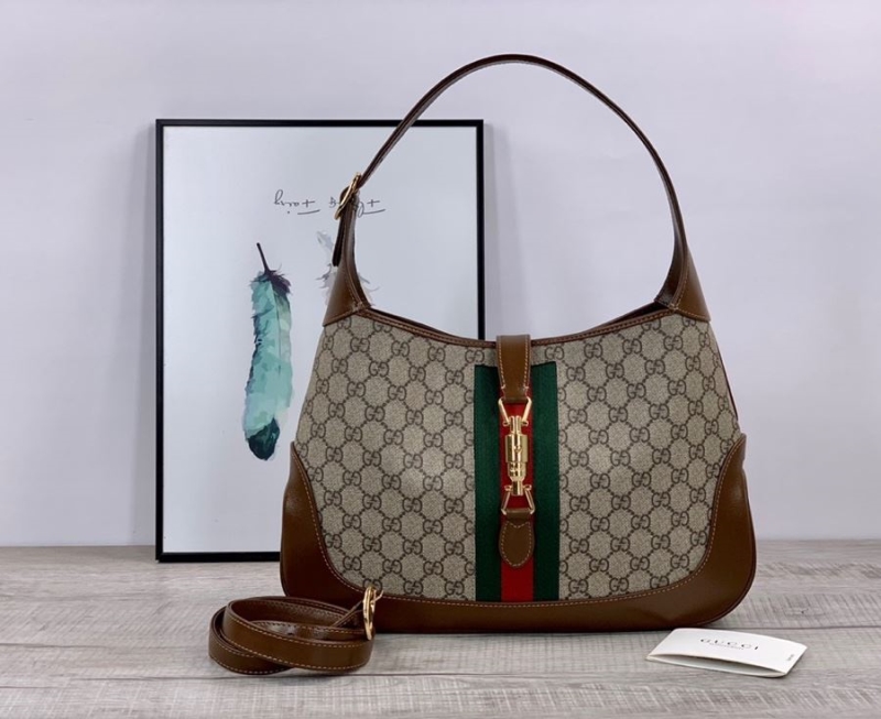 G*u*i top handle bags